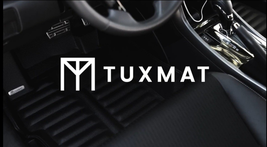 Tuxmat logo with car in the background